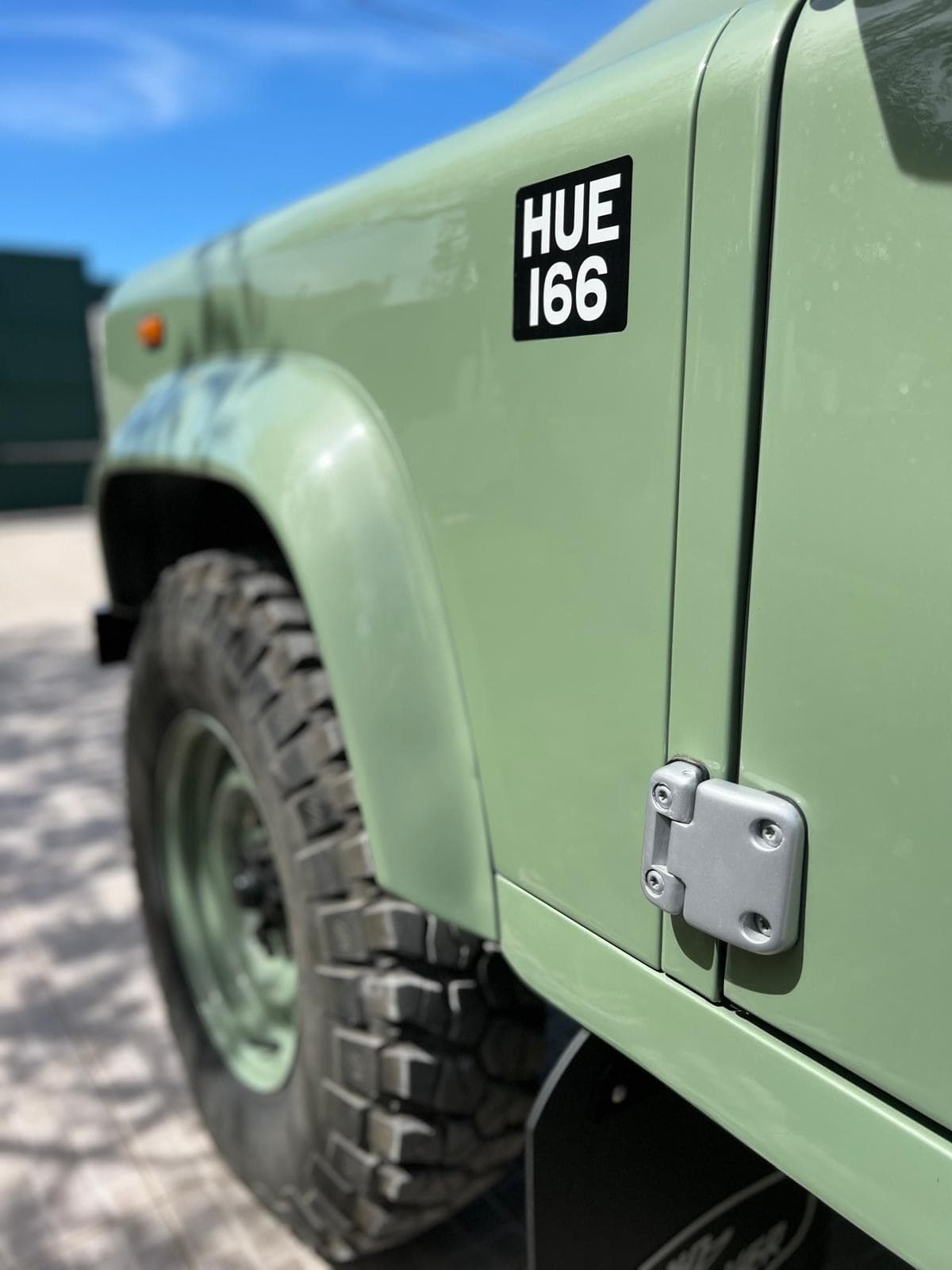 Detail of the Defender Heritage badge — HUE 166